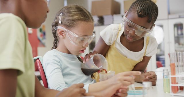 Diverse school children doing expeiments during science lesson at school - Download Free Stock Photos Pikwizard.com