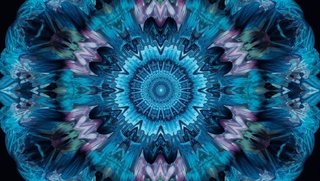 Mesmerizing blue and teal kaleidoscopic mandala pattern