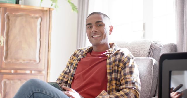 Happy Man Relaxing at Home with Smartphone - Download Free Stock Images Pikwizard.com