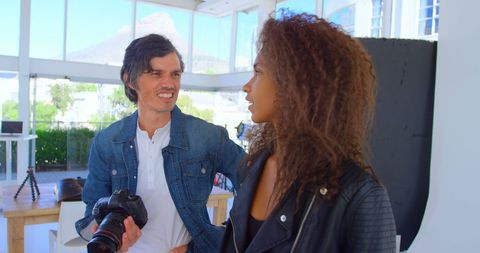 Photographer Teaches Techniques to Teen in Modern Studio