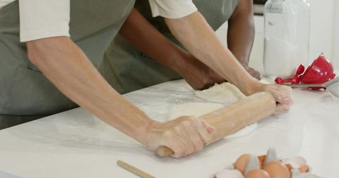 Diverse Friends Baking Together at Kitchen Counter