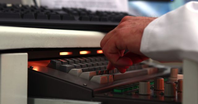 Hands of caucasian male doctor writing on computer in medical lab - Download Free Stock Photos Pikwizard.com