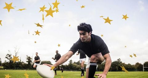rugby players on field with digital stars overlay - Download Free Stock Images Pikwizard.com