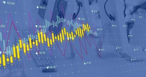 Analyzing Financial Data on Computer Screens with Headphones in Office - Download Free Stock Images Pikwizard.com