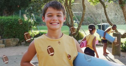 Smiling Boy with Yoga Mat at Outdoor Sports Activity