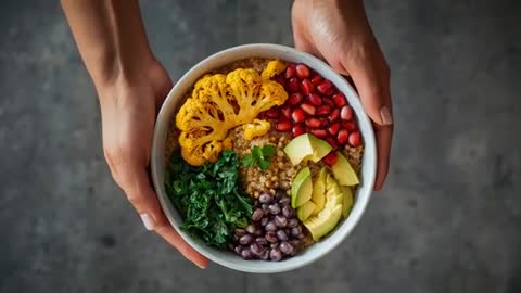 Nourishing Plant-Based Meal in Hands on Rustic Gray