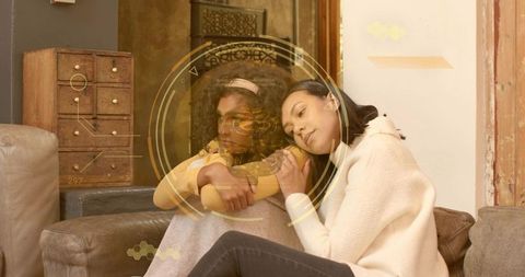 Comforting friendship on leather sofa with futuristic HUD overlay, cozy home companionship