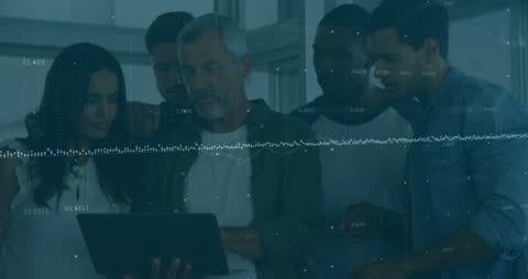 Team Analyzing Data on Digital Tablet in Modern Office