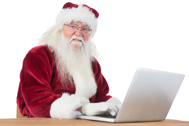 Santa Claus using laptop with cheerful expression and transparent background - Download Free Stock Videos Pikwizard.com