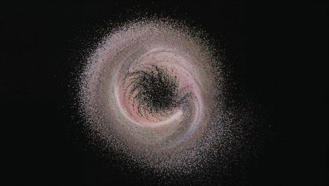 Swirling galaxy vortex of pink cream and blue particles rotating in dark cosmic void