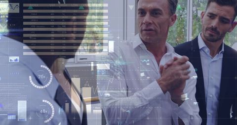 Business team discussing data analytics in office environment
