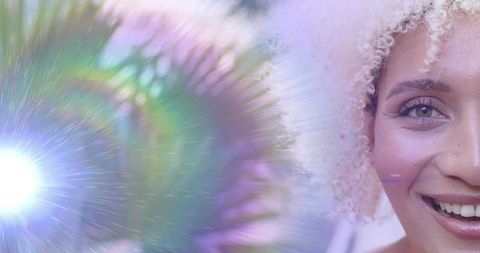 Vibrant Portrait with Captivating Colorful Lens Flare Patterns