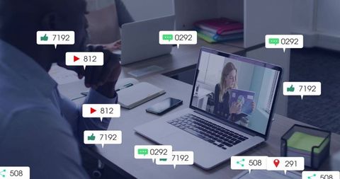 Remote webinar on laptop with social engagement icons and viewer analytics for teamwork