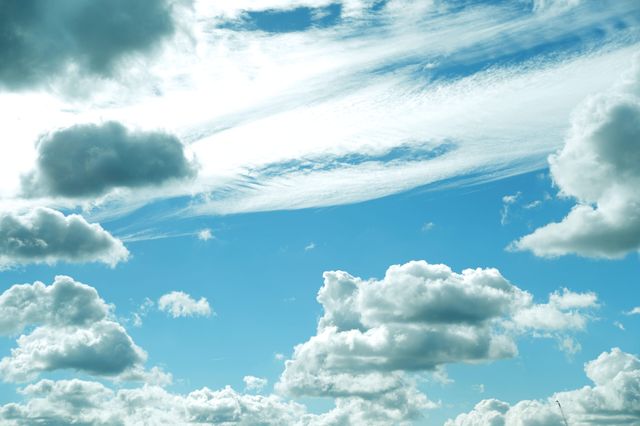 Scenic Blue Sky with Fluffy White Clouds on a Sunny Day - Download Free Stock Photos Pikwizard.com