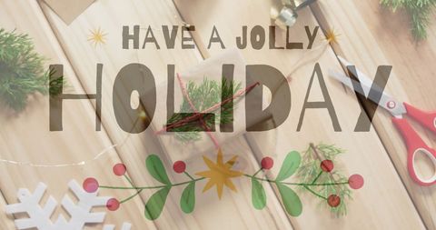 Festive holiday greeting amid gift wrapping decor