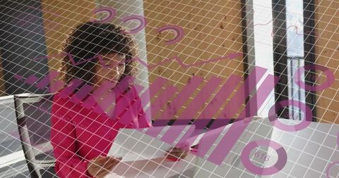 Analyst Reviewing Documents With Futuristic Data Overlay