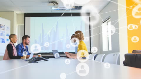 Diverse Team Analyzing Network Data in Modern Office