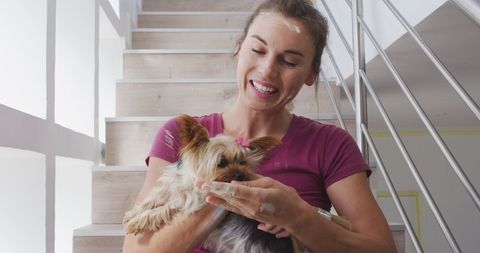 Woman Renovating Home Amid Pandemic with Loyal Dog Companion