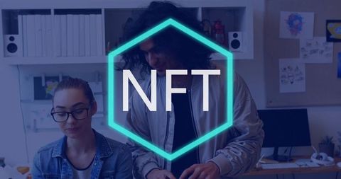 Colleagues Examining Screen in Creative Workspace with NFT Overlay