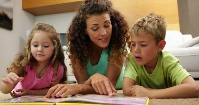 Mother Reading Storybook with Children on Floor in Living Room - Download Free Stock Images Pikwizard.com