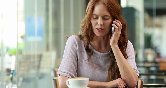 Woman talking on phone in cafe - Download Free Stock Images Pikwizard.com