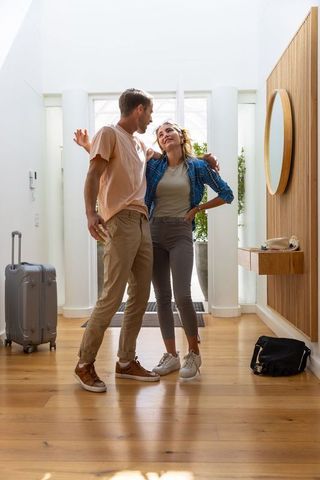 Happy Couple Arriving Home Male Sunglasses