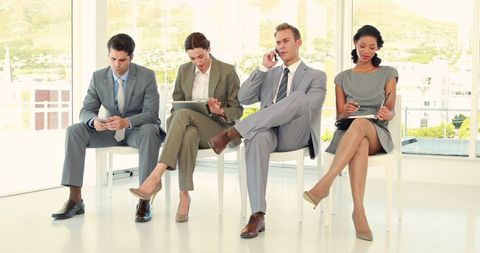 Diverse Business Professionals Engaged in Office Tasks - Download Free Stock Images Pikwizard.com