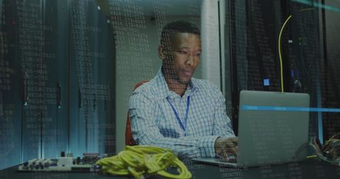 IT Engineer Analyzing Data with Server Racks in Background - Download Free Stock Images Pikwizard.com