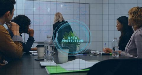 Presenting team discussing data protection strategy in boardroom with holographic overlay
