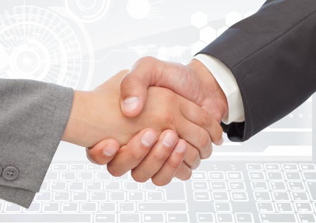 Businesspeople shaking hands over digital background symbolizing collaboration, success, and partnership in a digital age. Great for representing business agreements, professional collaboration, online deals, networking, teamwork, and successful negotiations.