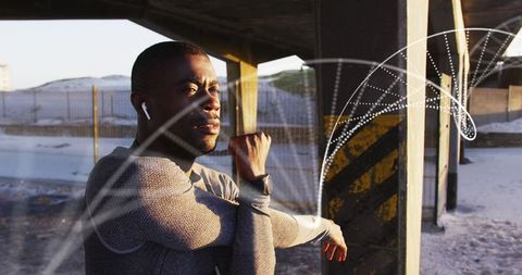 Futuristic Tech in Fitness: African American Man Stretching