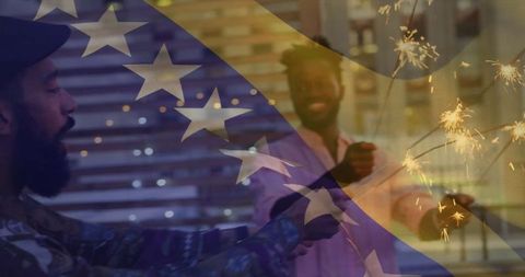 Two Friends Celebrating with Sparklers Indoors