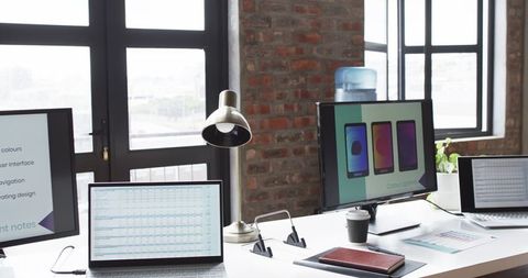 Modern Workspace With Multiple Screens and Office Supplies - Download Free Stock Images Pikwizard.com