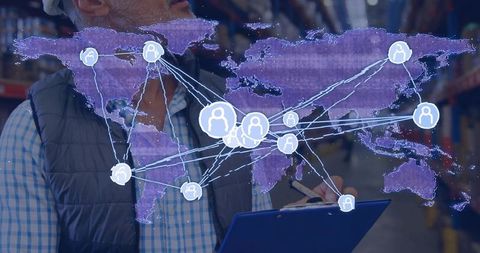 Warehouse manager inspecting global supply chain network with digital map overlay
