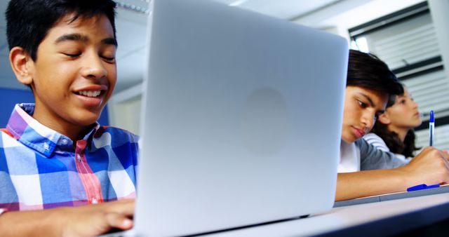 Students Studying in Classroom with Laptops and Notes - Download Free Stock Images Pikwizard.com