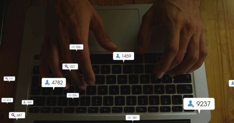 Typing on laptop displaying floating notification badges for live social media alerts