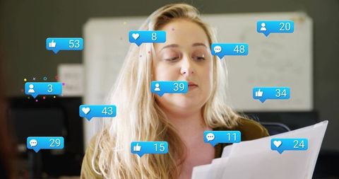 Professional woman reading documents surrounded by floating social media notifications