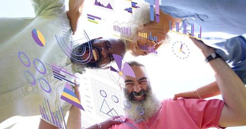 Smiling diverse team huddling in sunlit outdoors collaborating with floating infographics