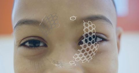 Child's face with futuristic ar technology interface