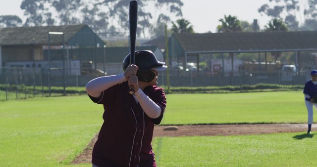 Baseball Player In Action Preparing To Bat On Pitch - Download Free Stock Images Pikwizard.com