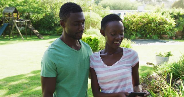 Couple Enjoying Time Together in Backyard Garden - Download Free Stock Images Pikwizard.com