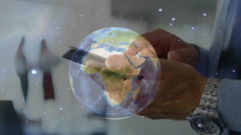 Businessman Using Smartphone with Overlapping Data Globe
