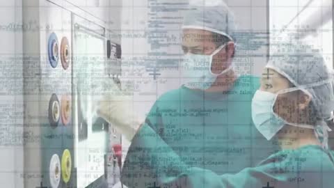 Doctors Utilizing Advanced Technology in Medical Imaging Room