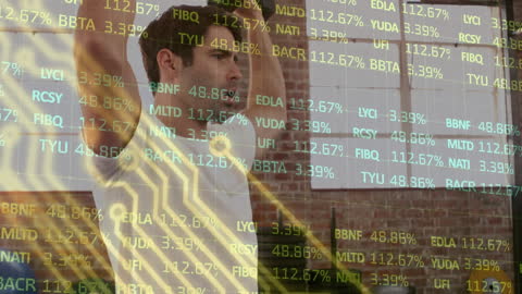 Businessman Analyzing Digital Financial Data in Futuristic Display
