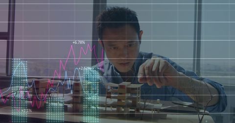 Asian Businessman Analyzing Financial Market Trends - Download Free Stock Images Pikwizard.com