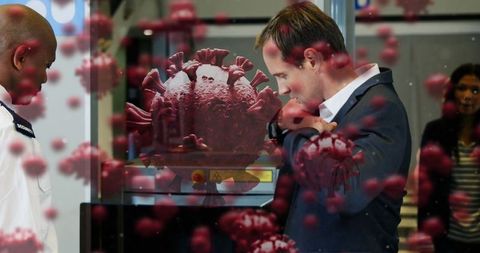 Business Professional Examining Coronavirus at Science Exhibit