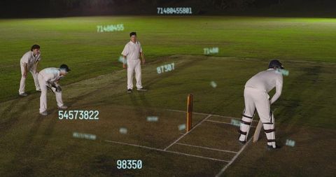 Standing batsman at crease wearing helmet and pads with holographic data overlays
