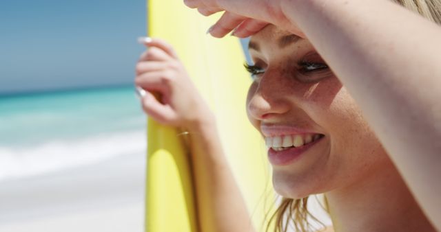 Woman with Surfboard Enjoying Sunny Day at Beach - Download Free Stock Images Pikwizard.com