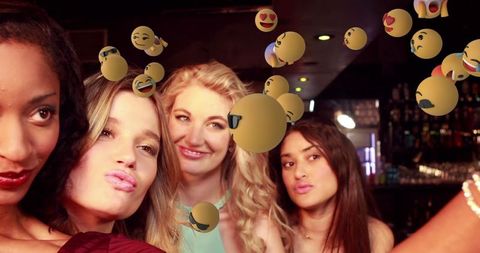 Women Enjoy Selfie at Party with Floating Emojis Celebration