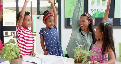 Teacher and Children Enthusiastically Engaging in Environmental Project - Download Free Stock Images Pikwizard.com